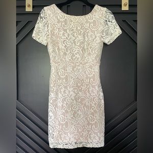 White lace open back mini dress